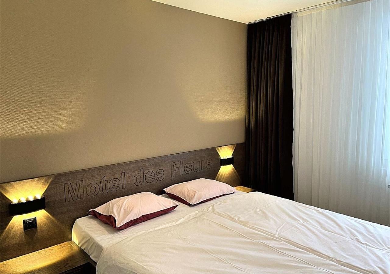 Motel Des Fleurs Servion Bagian luar foto