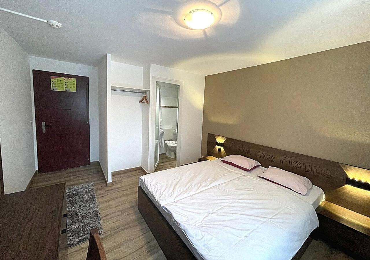 Motel Des Fleurs Servion Bagian luar foto