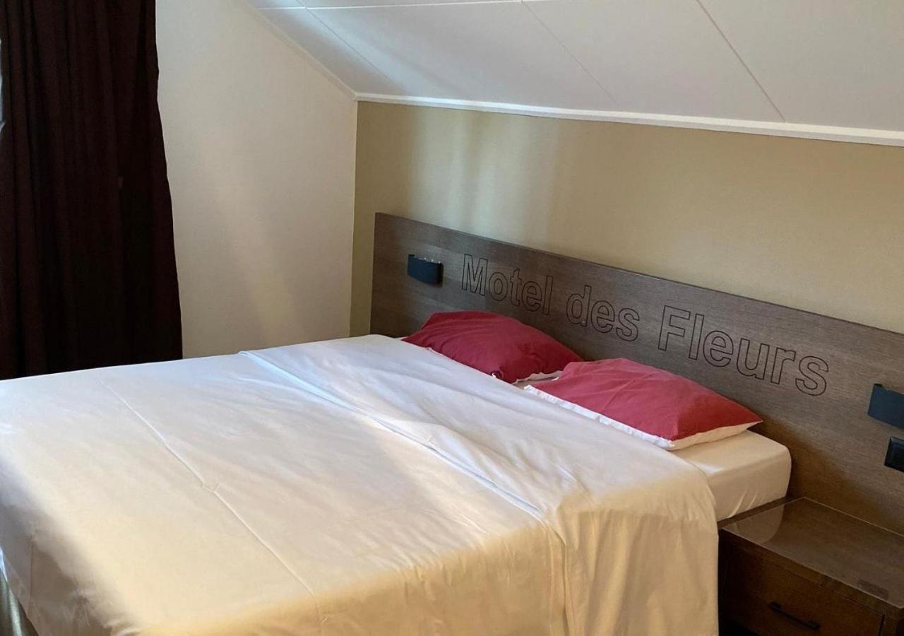 Motel Des Fleurs Servion Bagian luar foto