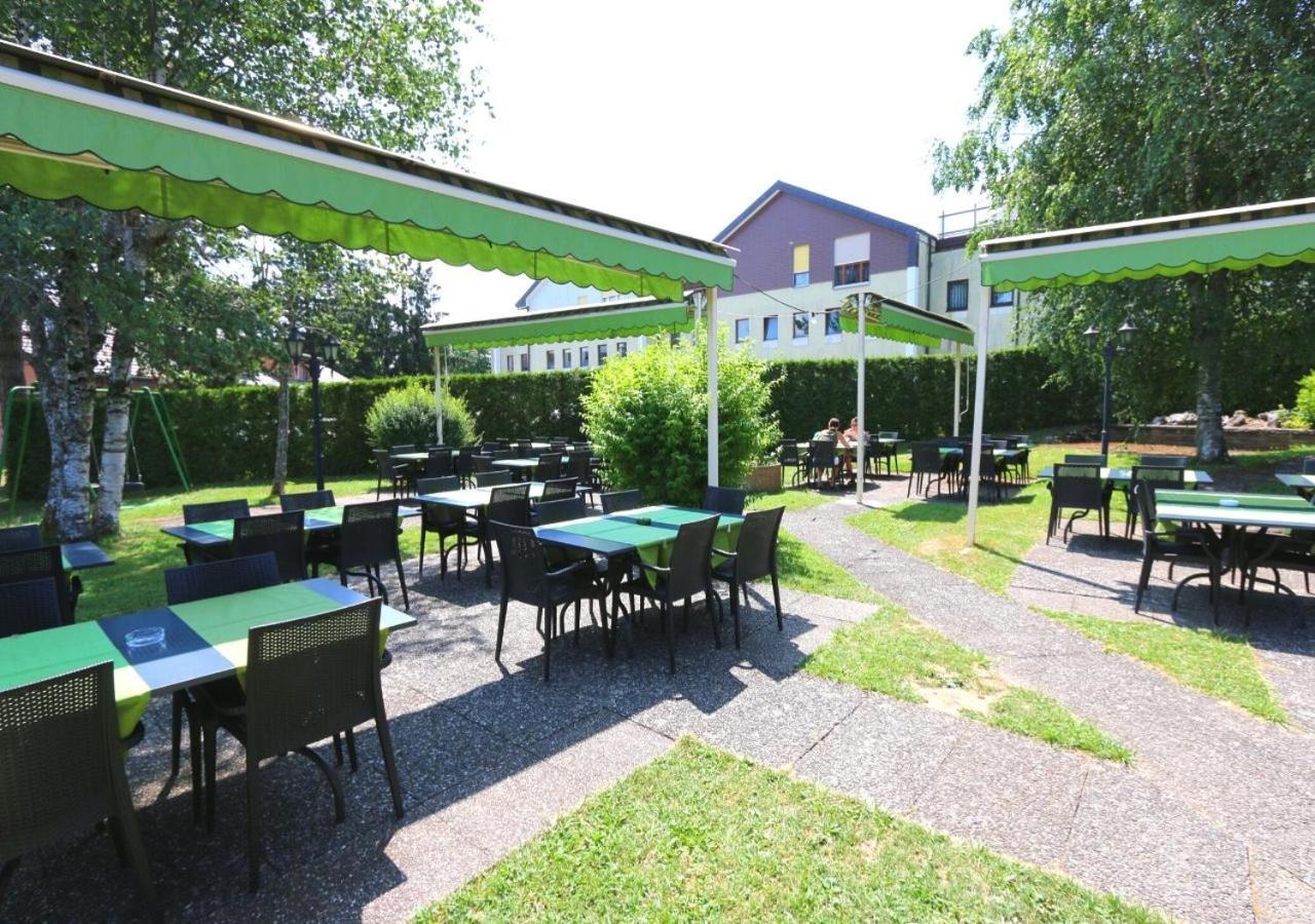 Motel Des Fleurs Servion Bagian luar foto