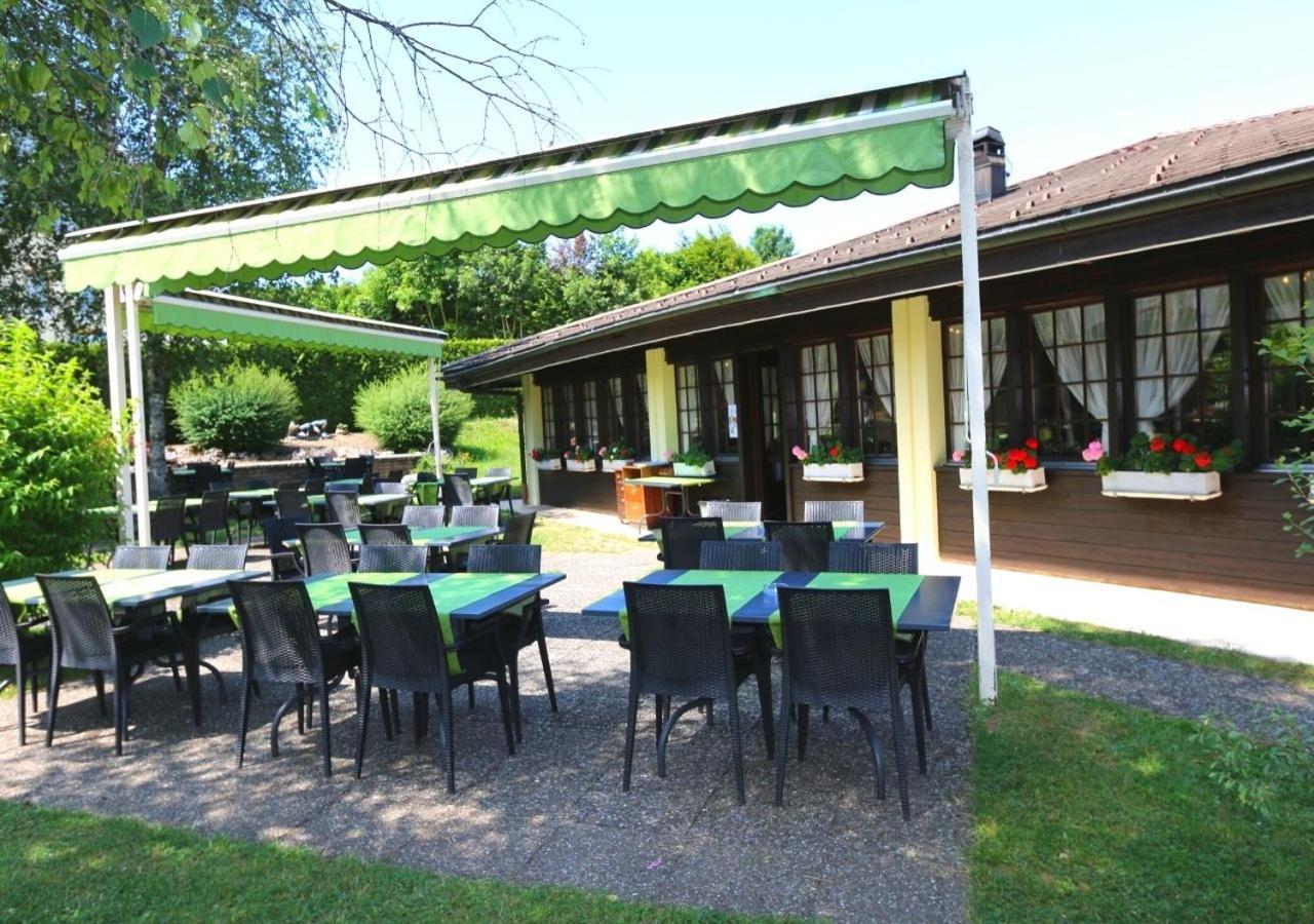 Motel Des Fleurs Servion Bagian luar foto
